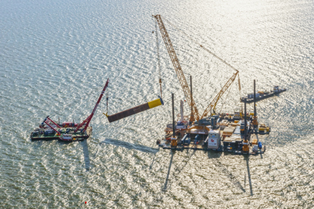 Floating crane Triton closely involved in construction of Fryslân Wind Farm