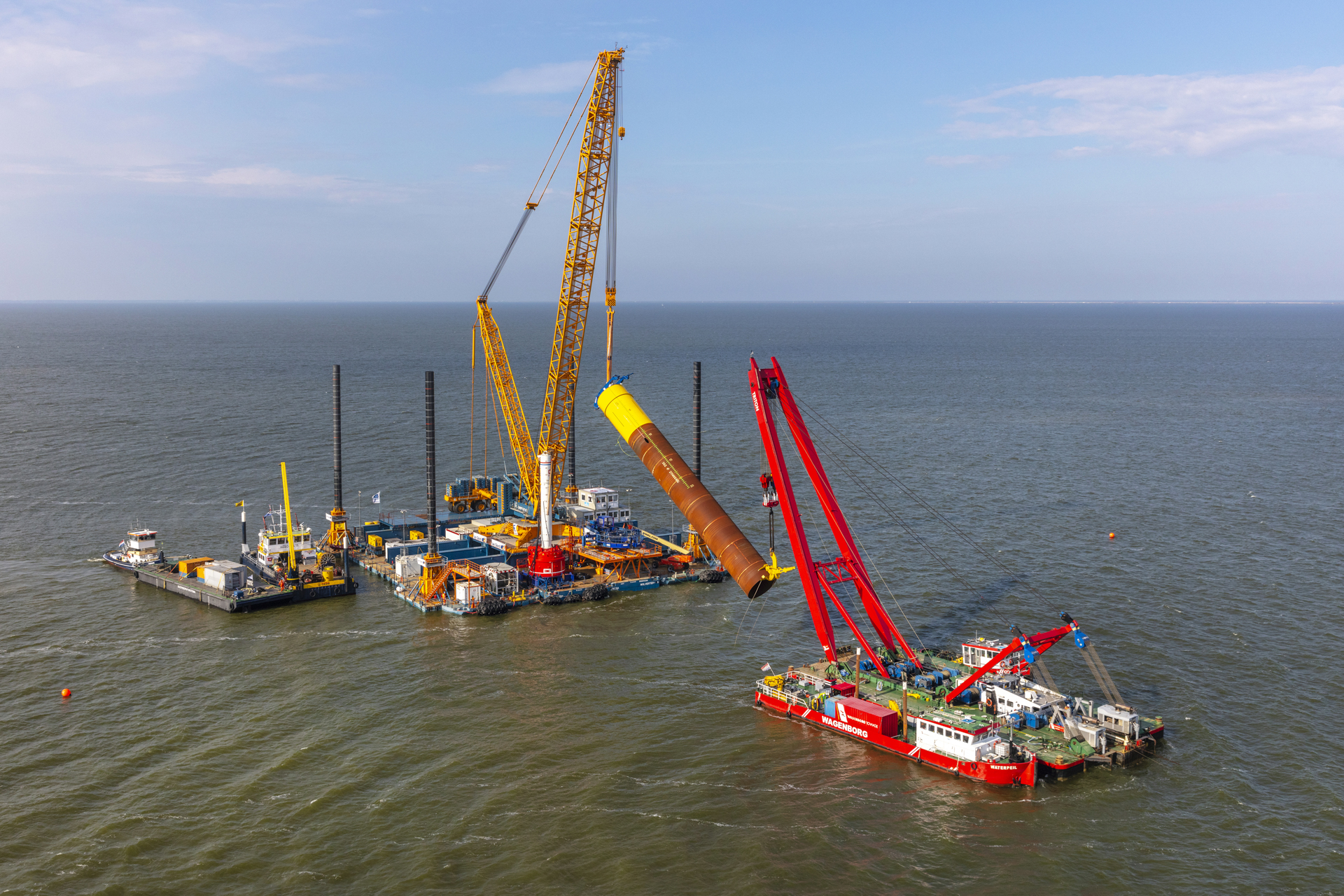 Floating crane Triton closely involved in construction of Fryslân Wind Farm