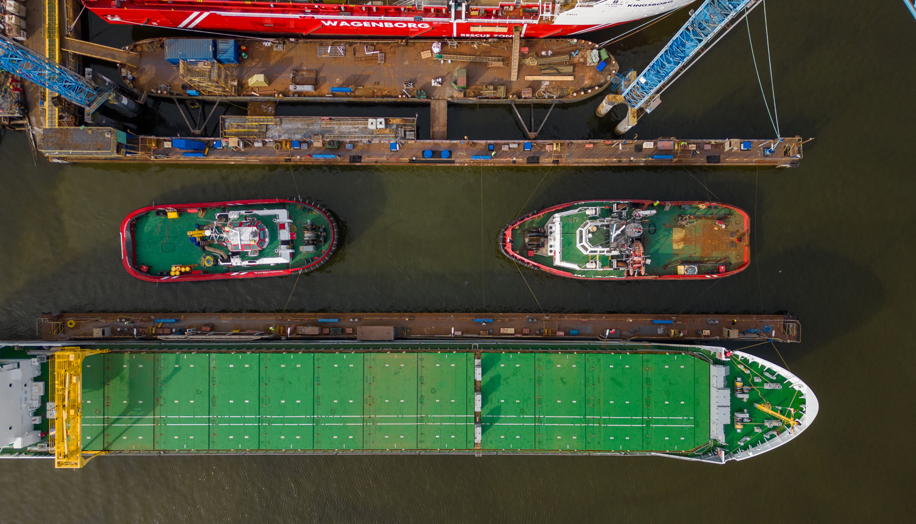 The tugs Waterstroom (left) and Waterman (right) are docked at shipyard Niestern Sander